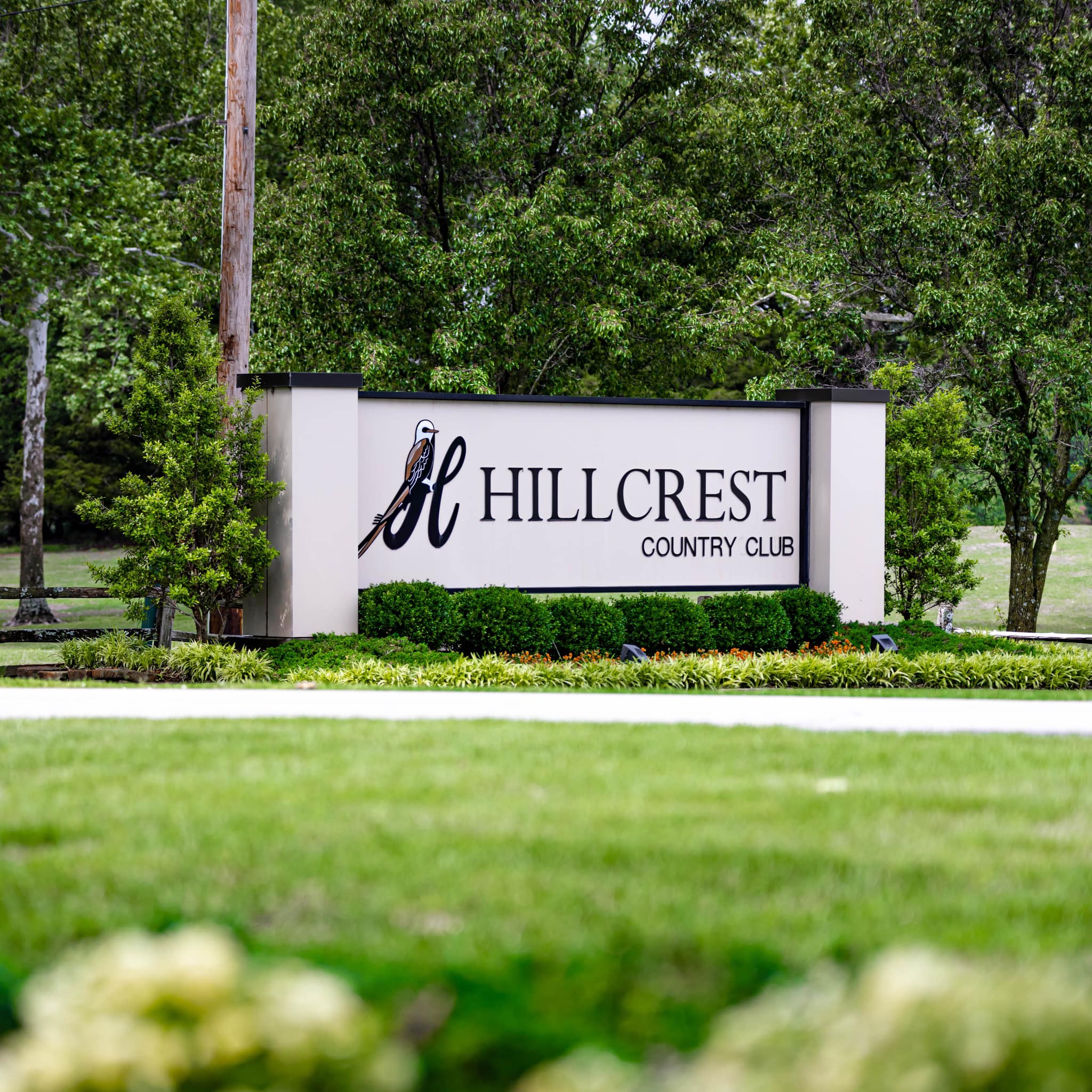Father and child high-fiving on the golf course