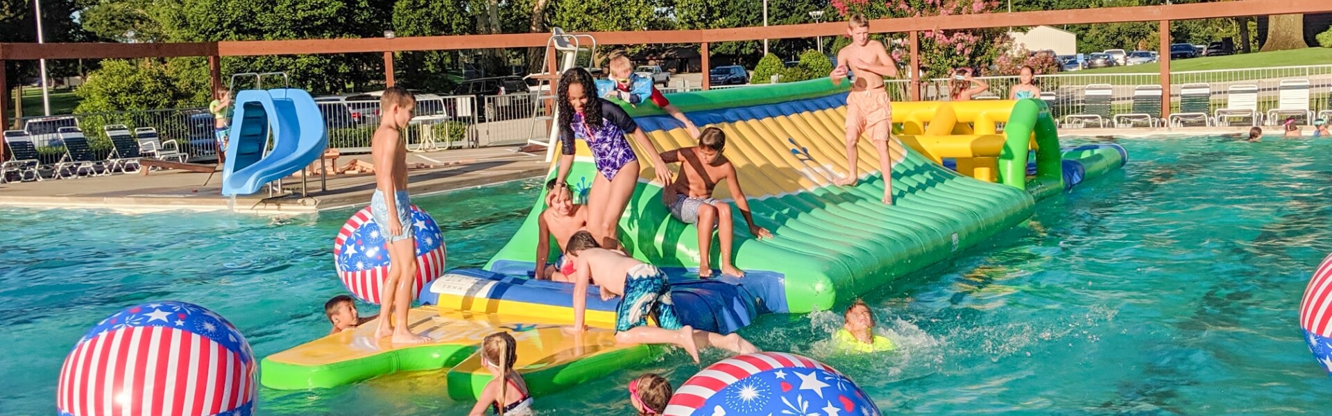 Father and child high-fiving on the golf course