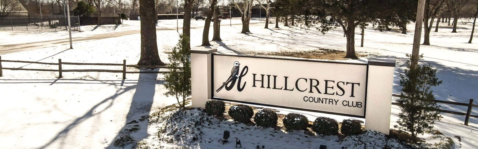 Father and child high-fiving on the golf course