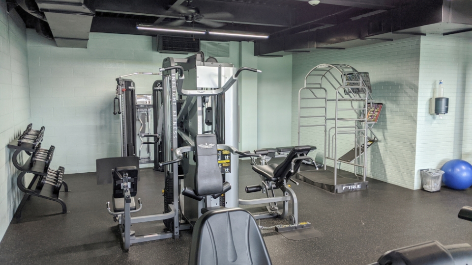 Father and child high-fiving on the golf course