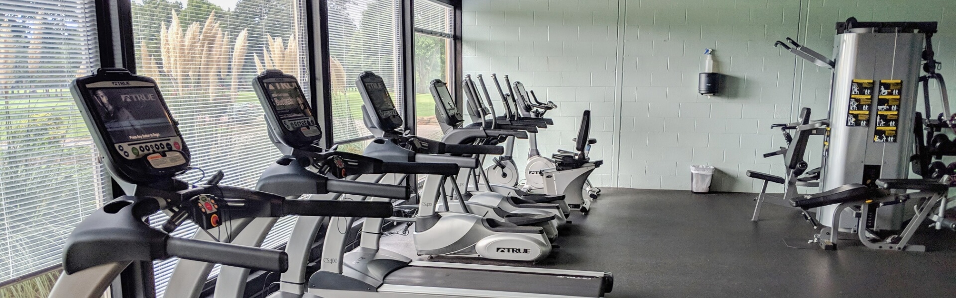 Father and child high-fiving on the golf course